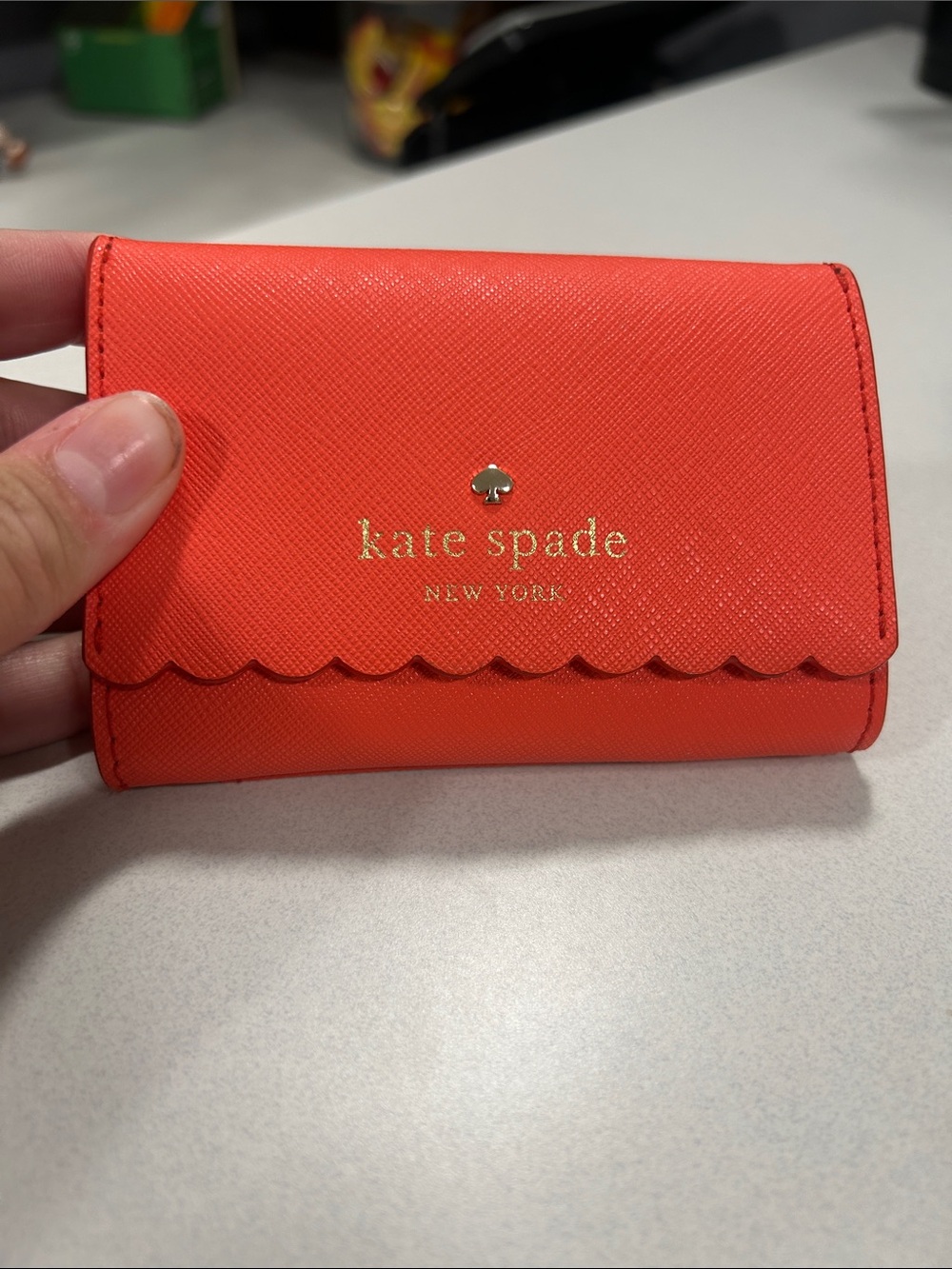 kate spade coral scallop flap card case